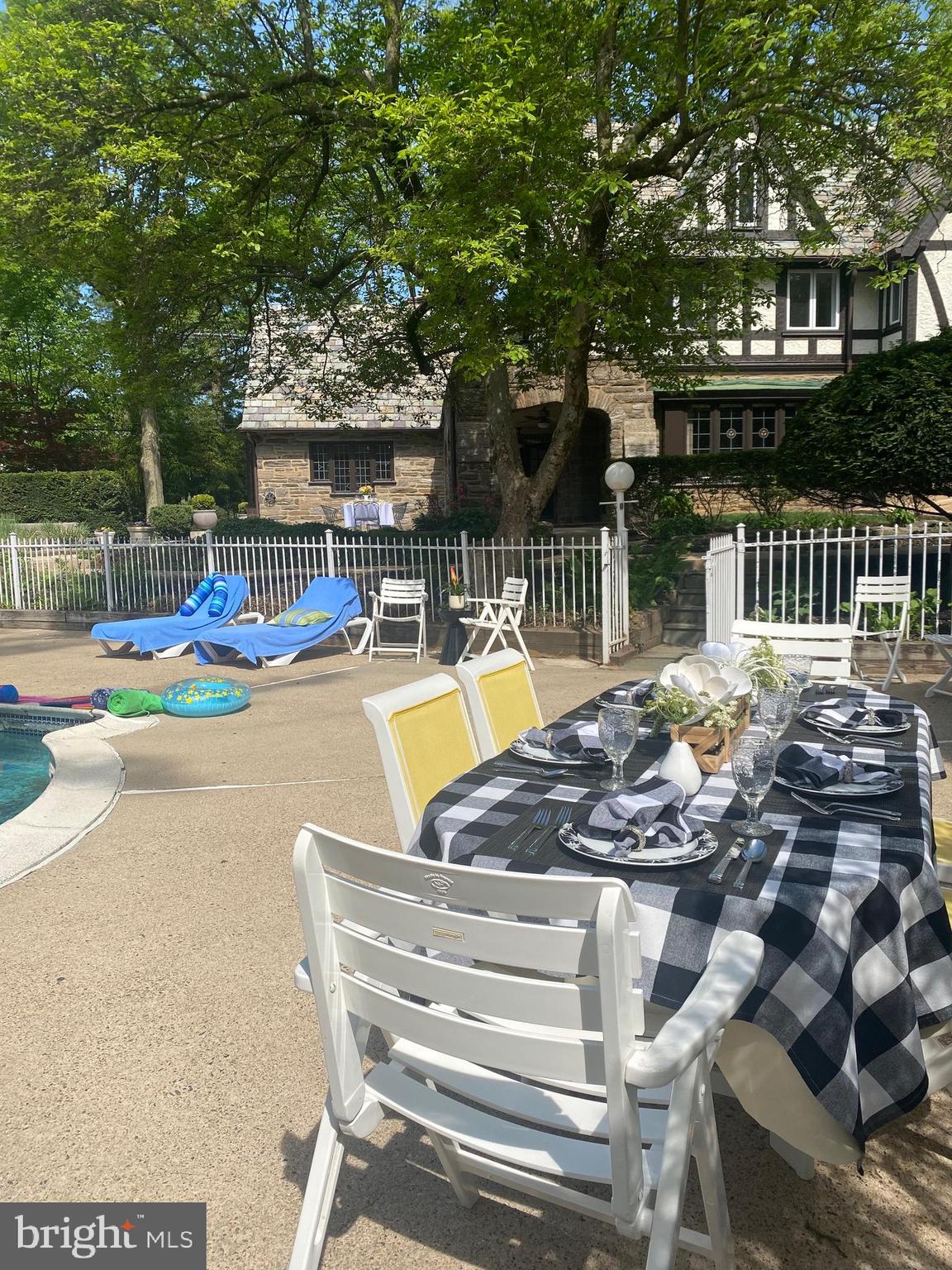 857 Meetinghouse Road Rydal, PA 19046 - Photo 88 of 93 a view of a swimming pool with a patio and a yard