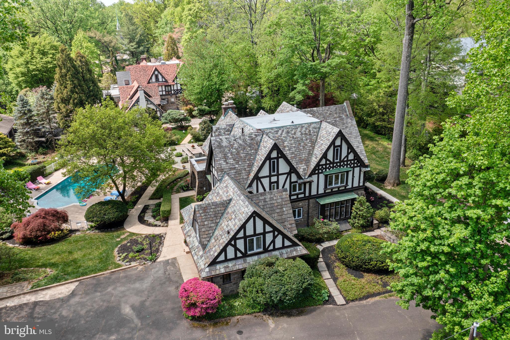 857 Meetinghouse Road Rydal, PA 19046 - Photo 91 of 93 a view of a house with a yard and garden