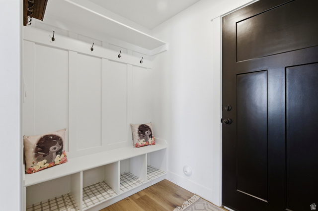 3902 West 825 North West Point, UT 84015 - Photo 29 of 49 Mudroom featuring light wood-style floors and baseboards