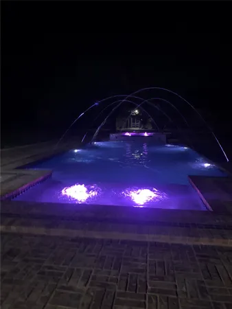 a view of a fountain of the house