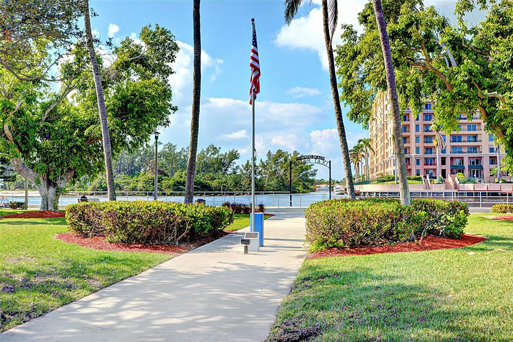 1110 North Riverside Drive, Unit 24 Pompano Beach, FL 33062 - Photo 22 of 42 a garden view with a fountain