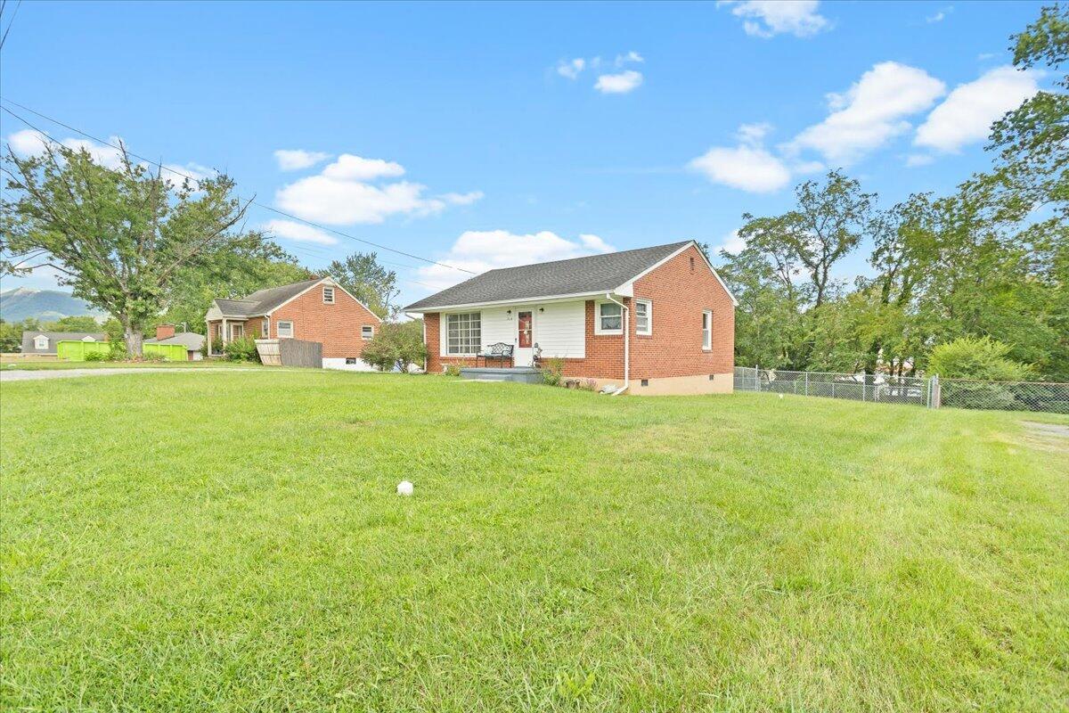 218 Post Road Roanoke, VA 24019 - Photo 1 of 24 a view of house with a garden