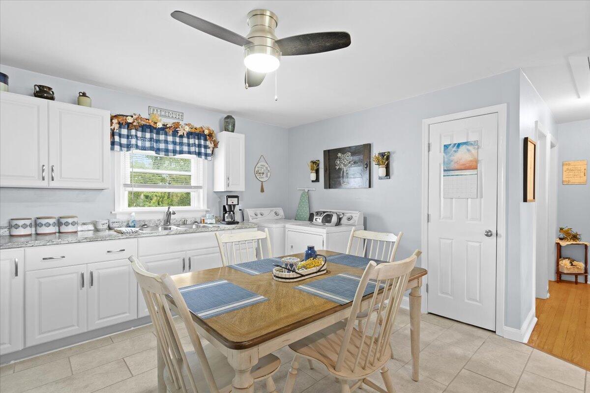 218 Post Road Roanoke, VA 24019 - Photo 11 of 24 a dining table with chairs and window