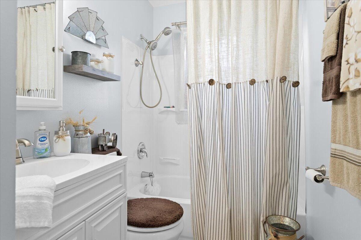 218 Post Road Roanoke, VA 24019 - Photo 13 of 24 a bathroom with a sink vanity and toilet