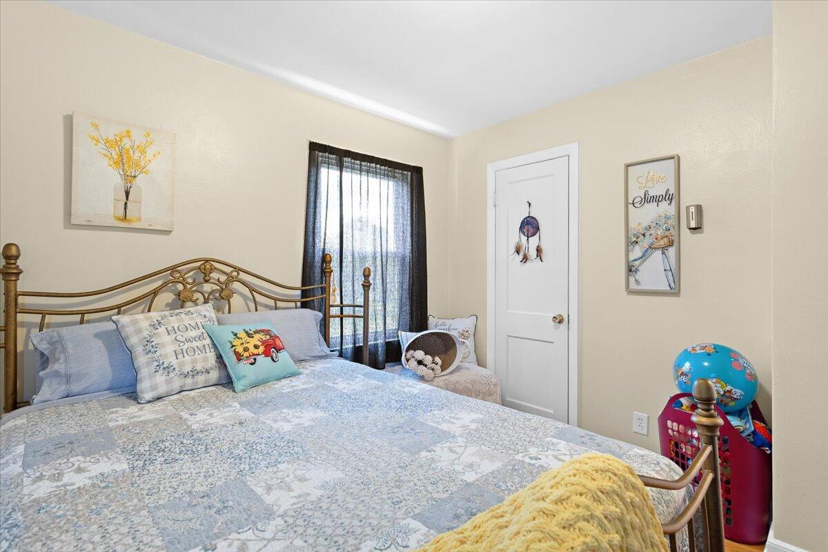 218 Post Road Roanoke, VA 24019 - Photo 16 of 24 a bedroom with a bed and a window