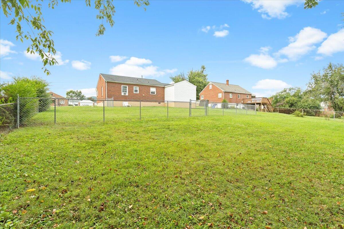 218 Post Road Roanoke, VA 24019 - Photo 23 of 24 a view of an house with a backyard