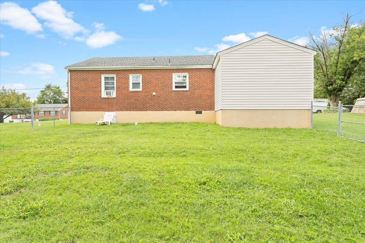 218 Post Road Roanoke, VA 24019 - Photo 24 of 24 a view of a backyard with a garden and entertaining space