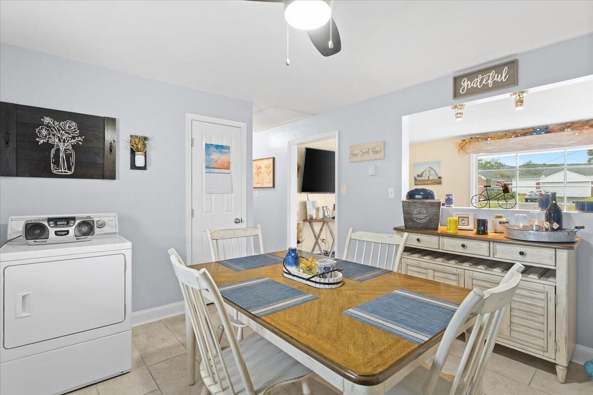 218 Post Road Roanoke, VA 24019 - Photo 10 of 24 a view of a dining room with furniture and wooden floor