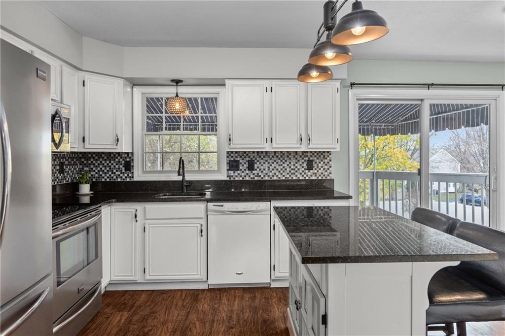 28 McBride Road Canonsburg, PA 15317 - Photo 14 of 33 a kitchen with granite countertop a sink stainless steel appliances and cabinets