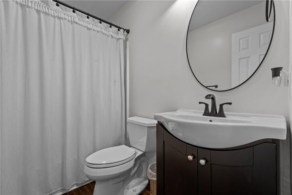28 McBride Road Canonsburg, PA 15317 - Photo 21 of 33 a bathroom with a sink a toilet and a mirror