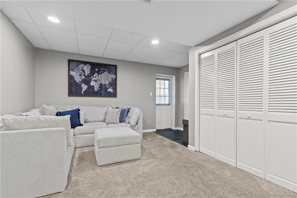 28 McBride Road Canonsburg, PA 15317 - Photo 26 of 33 a living room with furniture and a window