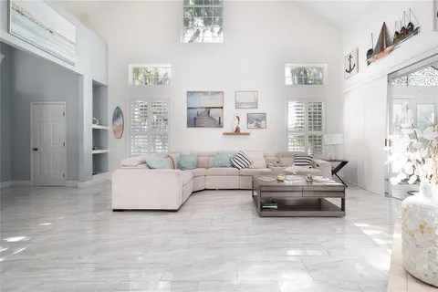 a living room with furniture and a couch