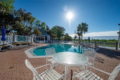 a view of a patio with swimming pool