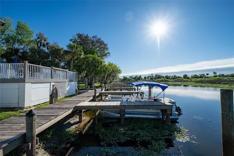 a view of house with outdoor space and seating area