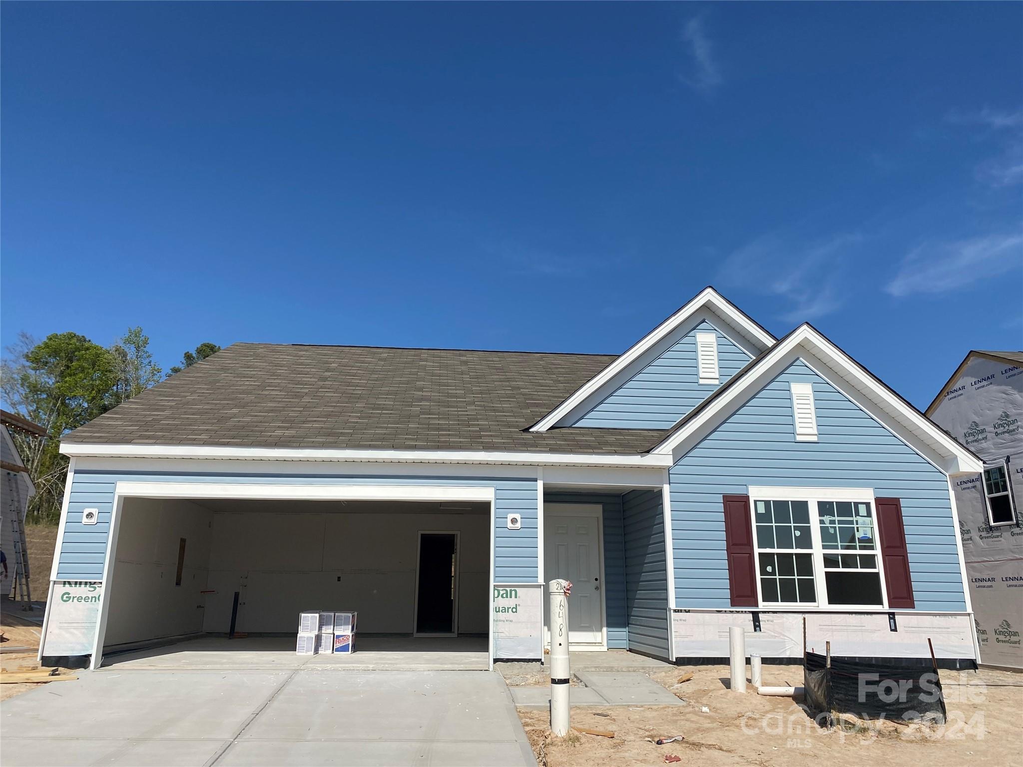 648 Mile Crk Road, Unit 20 Edgemoor, SC 29712 - Photo 2 of 22 a front view of a house with a garage