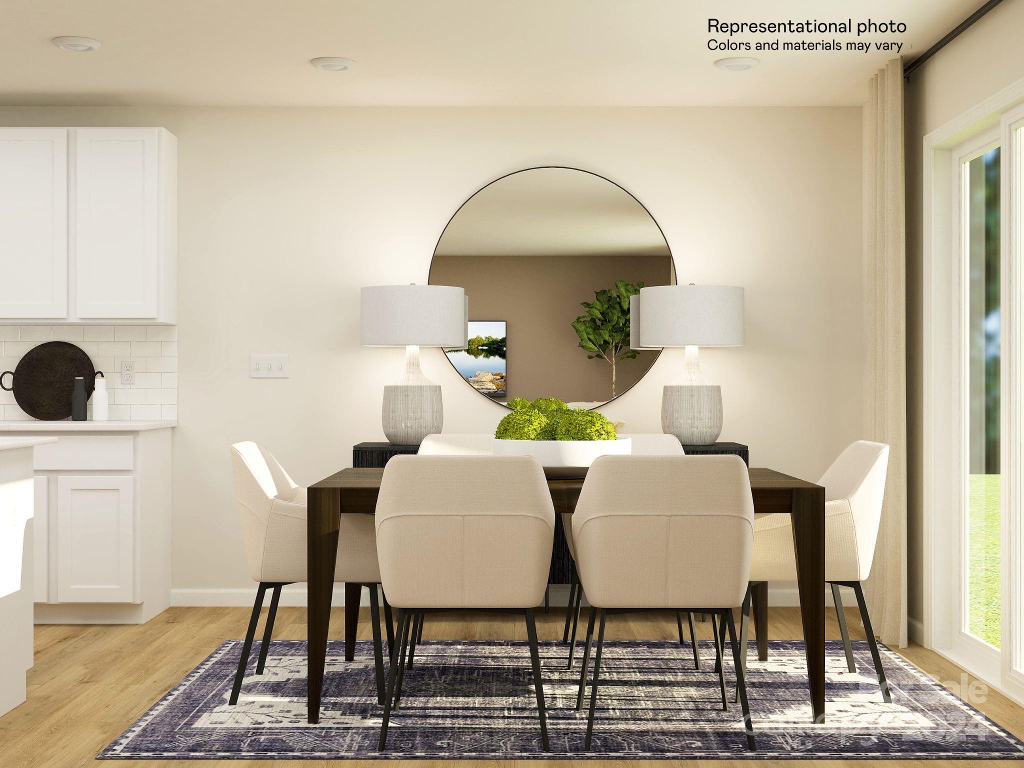 648 Mile Crk Road, Unit 20 Edgemoor, SC 29712 - Photo 9 of 22 a view of a dining room with furniture and wooden floor
