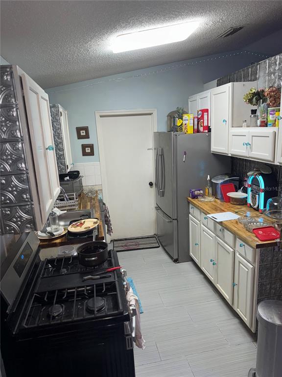 11305 Southeast 76th Avenue Belleview, FL 34420 - Photo 4 of 6 a utility room with sink dryer and washer