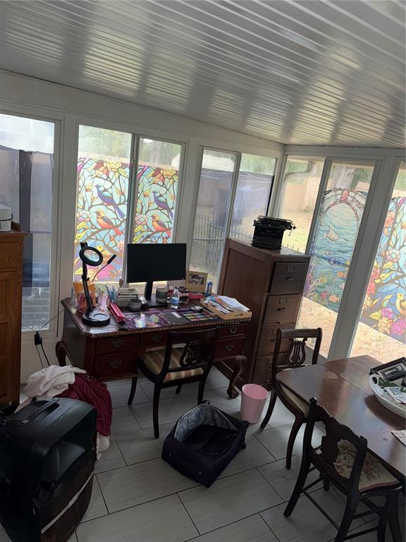 11305 Southeast 76th Avenue Belleview, FL 34420 - Photo 6 of 6 a view of a workspace with furniture