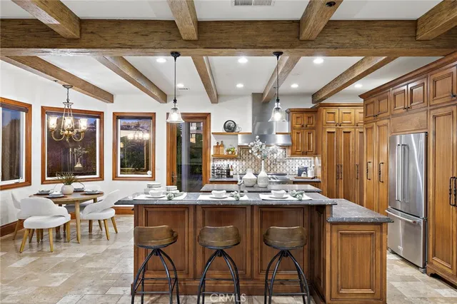 a view of a porch with furniture and a yard