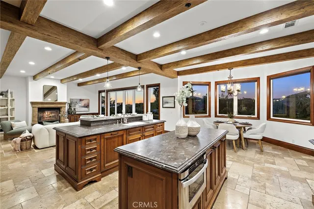 a bedroom with a bed and glass windows