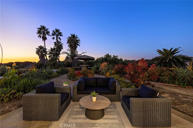 a work room with furniture and a large window