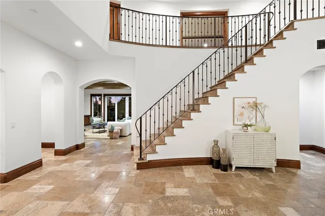 a view of a swimming pool with a lounge chairs