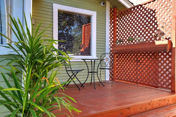 a view of a chairs and table in the patio