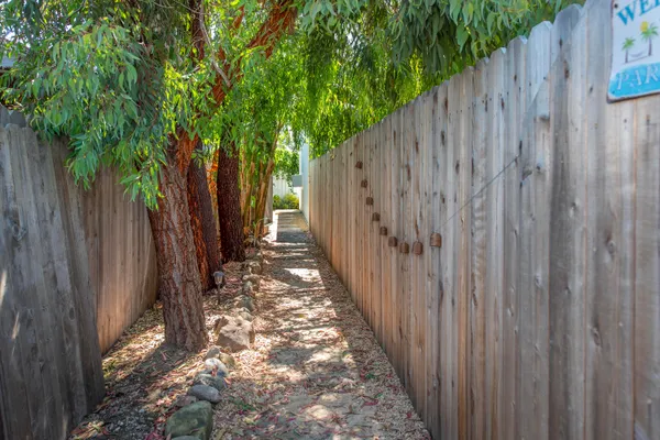 a view of a wooden fence