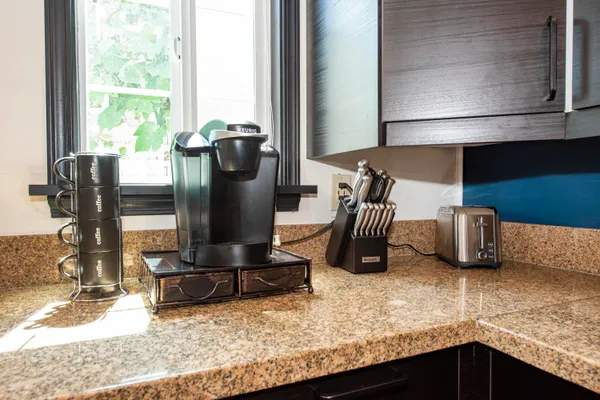 a kitchen with a sink and a window