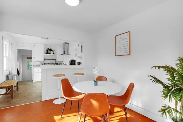 a table and chairs in a kitchen