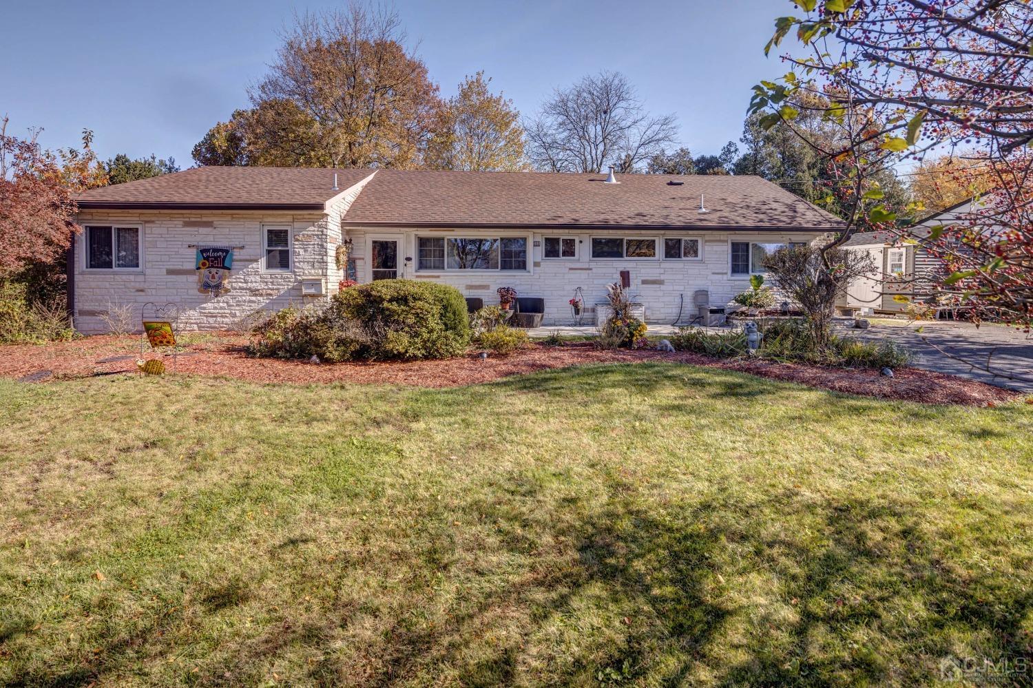 30 Cambridge Road Kendall Park, NJ 08824 - Photo 1 of 43 front view of a house with a big yard
