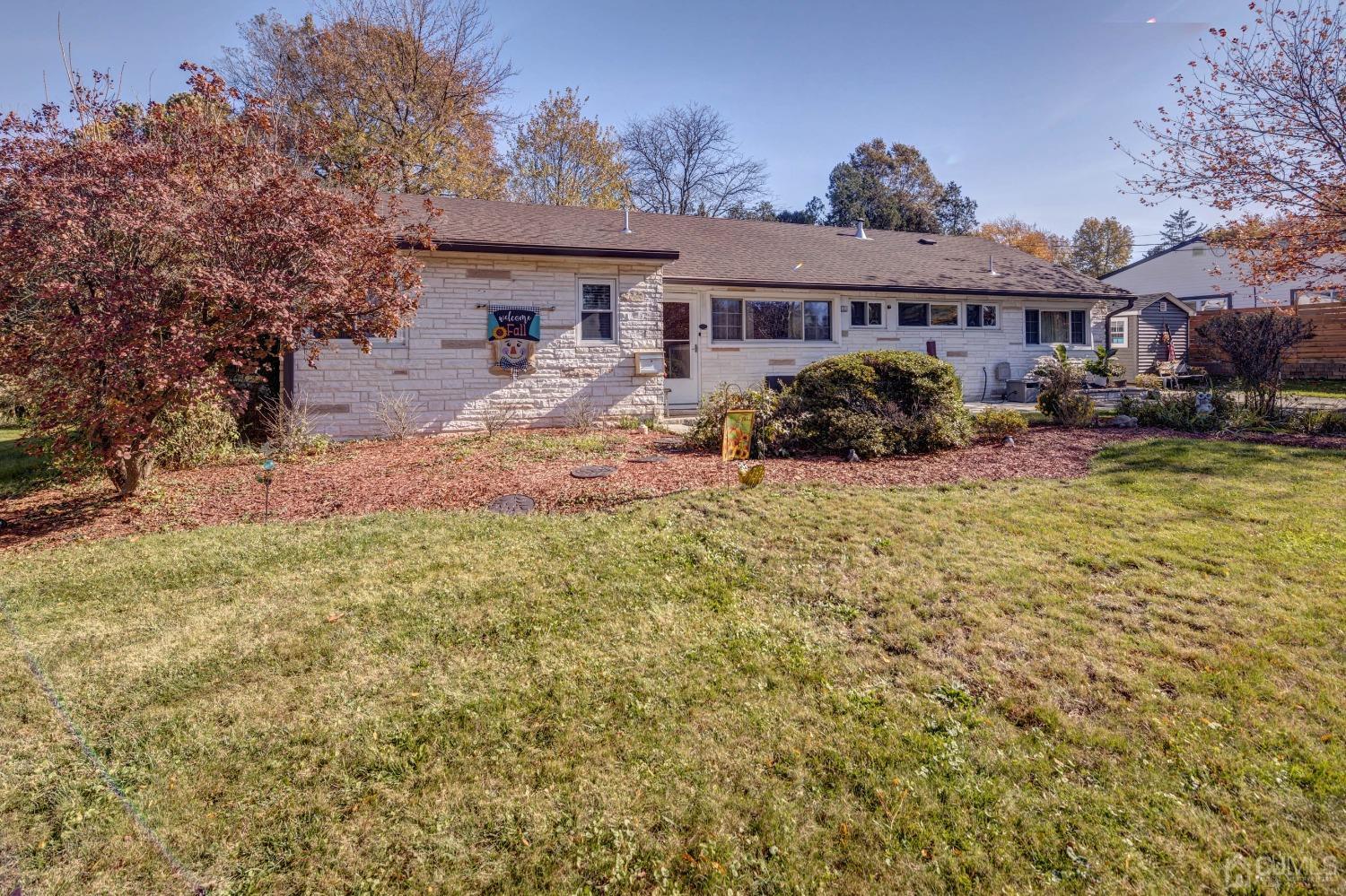 30 Cambridge Road Kendall Park, NJ 08824 - Photo 2 of 43 a view of a house with backyard and sitting area