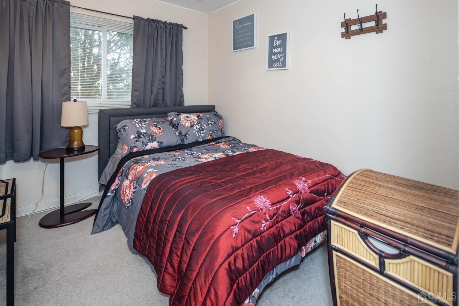 30 Cambridge Road Kendall Park, NJ 08824 - Photo 25 of 43 a bedroom with a bed and window