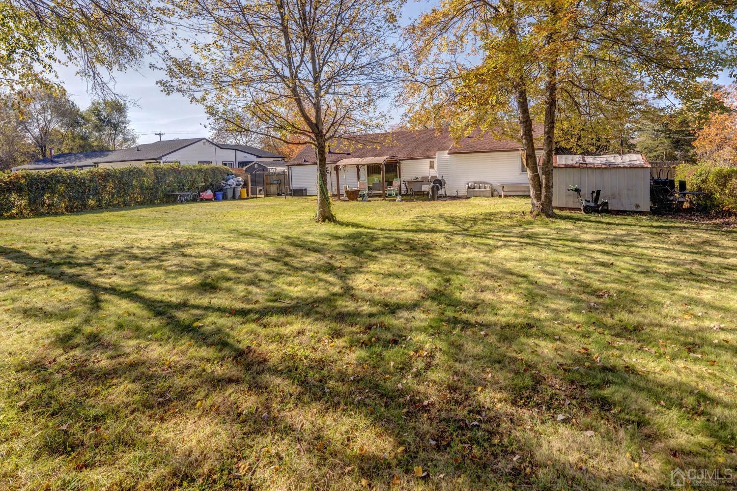 30 Cambridge Road Kendall Park, NJ 08824 - Photo 32 of 43 a view of a house with snow yard
