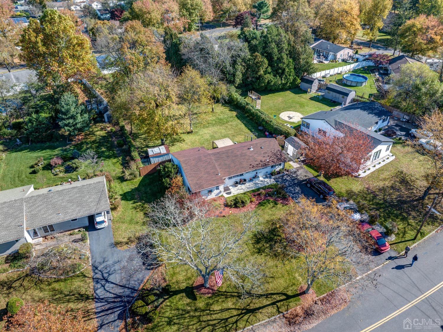 30 Cambridge Road Kendall Park, NJ 08824 - Photo 35 of 43 an aerial view of a house with a garden