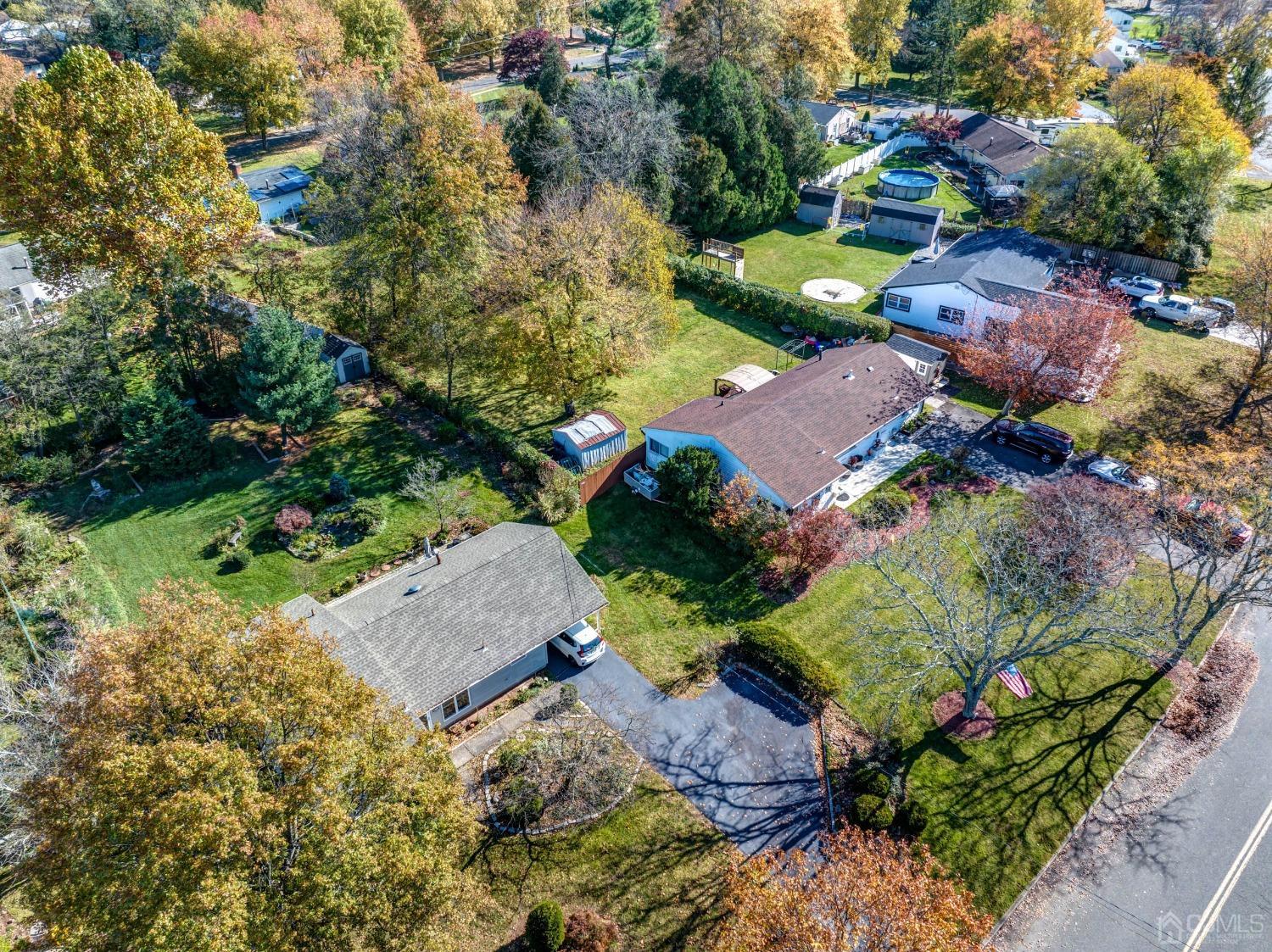30 Cambridge Road Kendall Park, NJ 08824 - Photo 36 of 43 an aerial view of a house with a garden