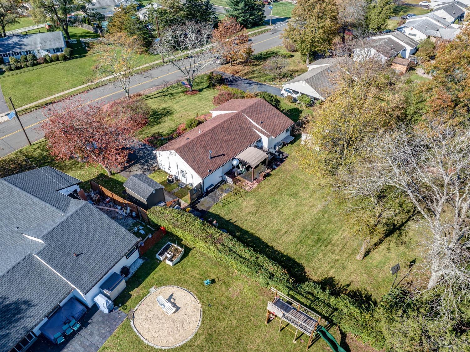 30 Cambridge Road Kendall Park, NJ 08824 - Photo 38 of 43 an aerial view of a house with a yard