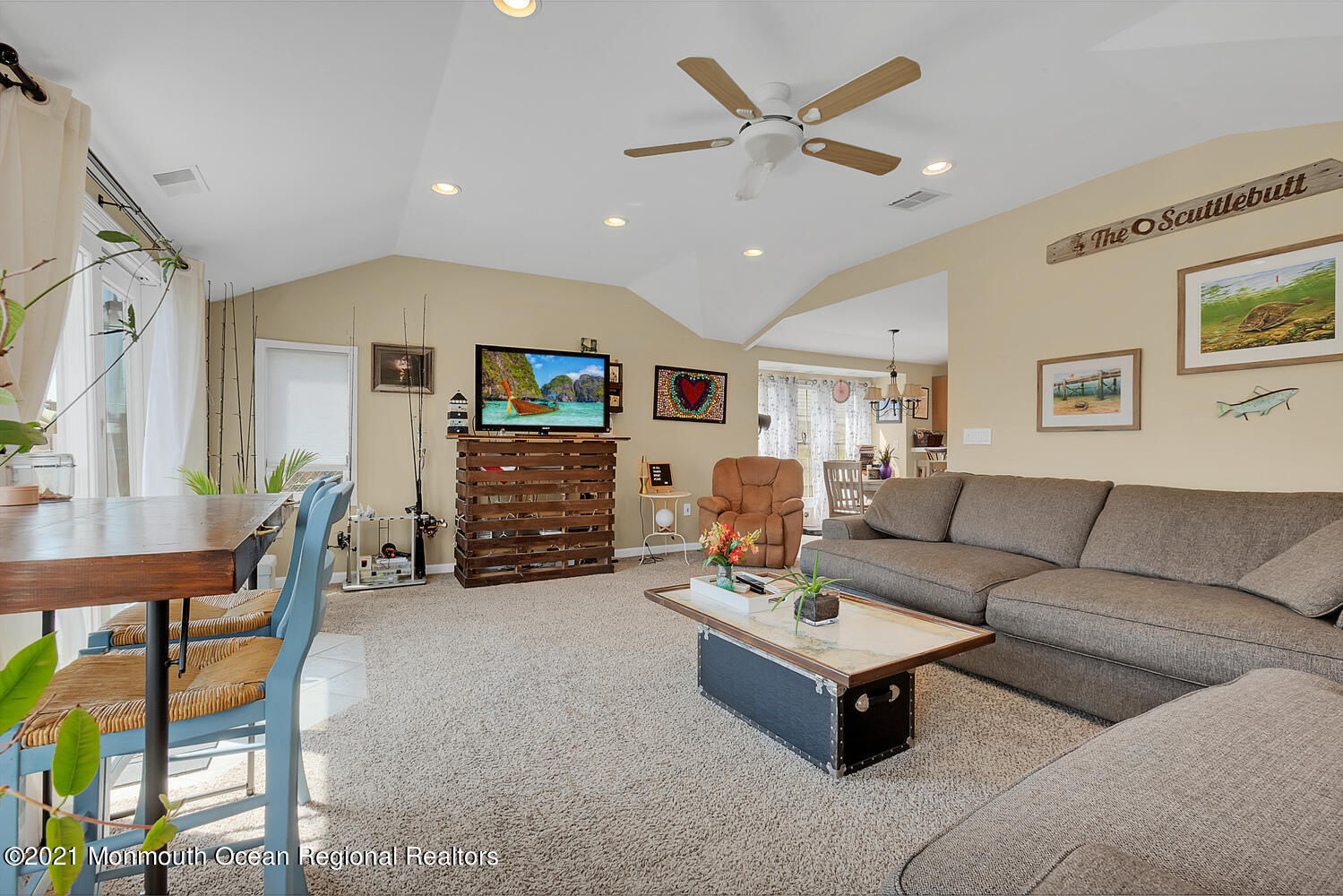26 Capstan Road Waretown, NJ 08758 - Photo 13 of 23 a living room with furniture a table and kitchen view