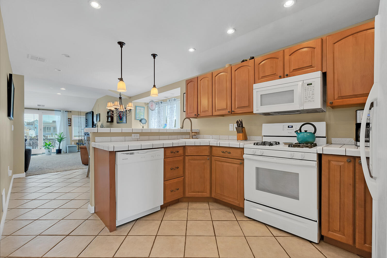 26 Capstan Road Waretown, NJ 08758 - Photo 7 of 23 a kitchen with stainless steel appliances granite countertop a stove a sink and a refrigerator