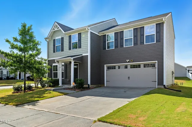 a front view of house with yard
