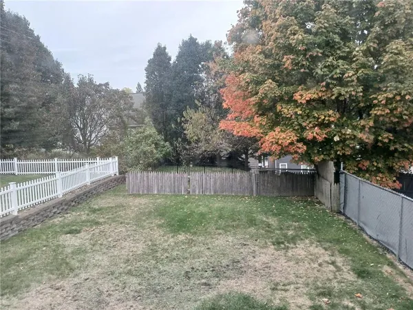 a kitchen with a stove and a refrigerator