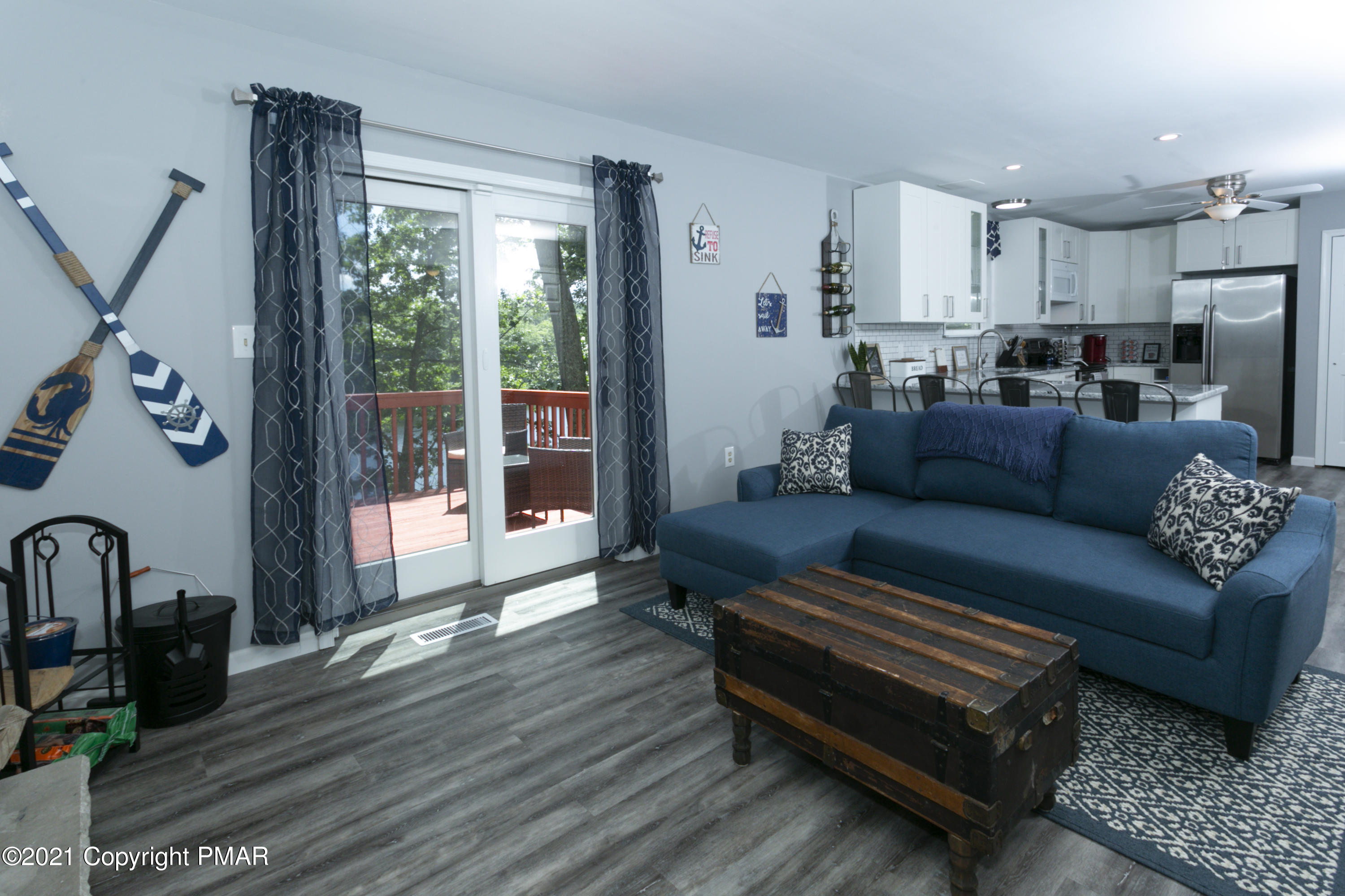 2155 Lancaster Drive Bushkill, PA 18324 - Photo 15 of 57 a living room with furniture and a wooden floor