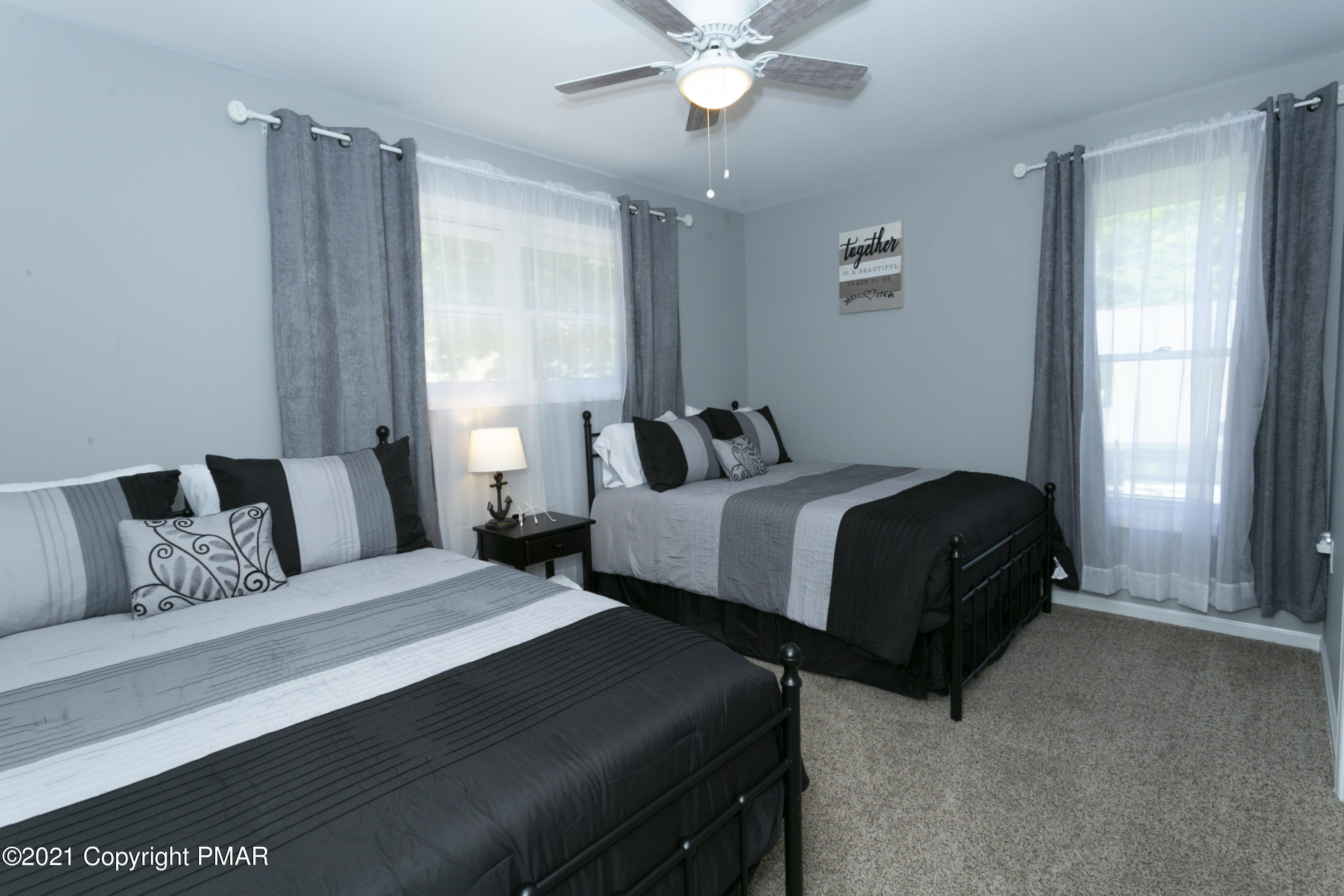 2155 Lancaster Drive Bushkill, PA 18324 - Photo 23 of 57 a bedroom with bed and window