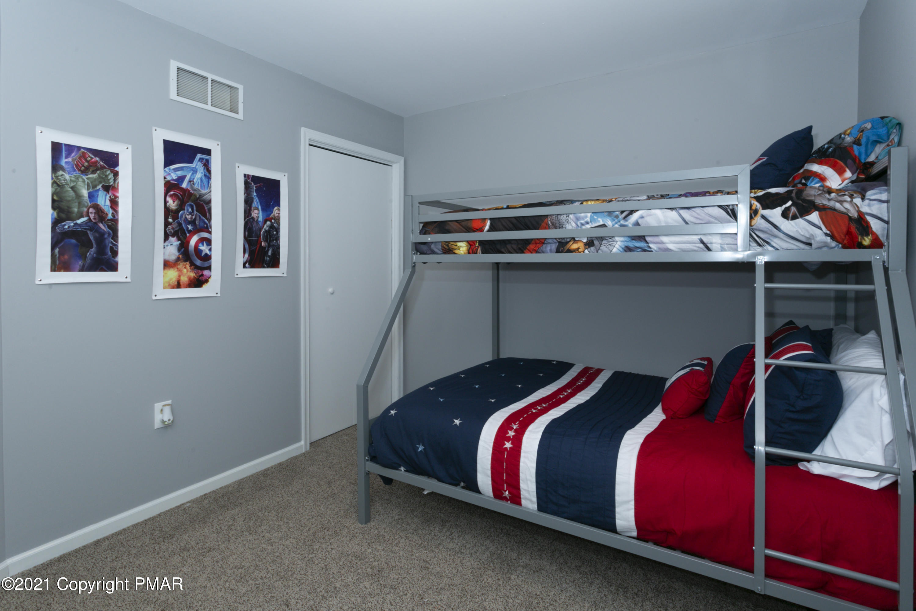 2155 Lancaster Drive Bushkill, PA 18324 - Photo 26 of 57 a bed room with a bed and a closet