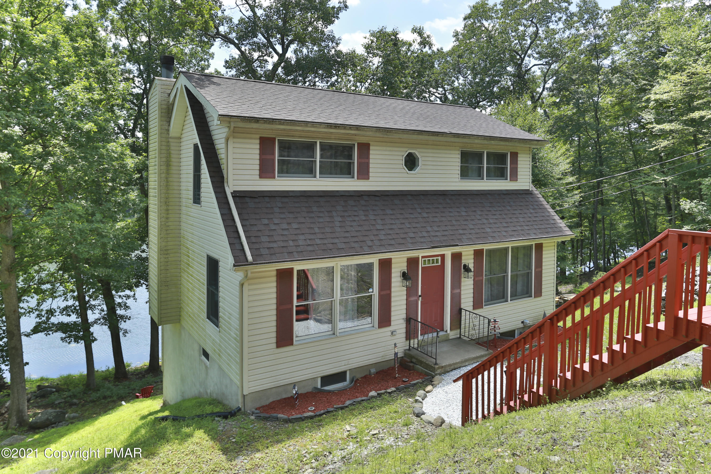 2155 Lancaster Drive Bushkill, PA 18324 - Photo 3 of 57 a view of house with backyard and deck