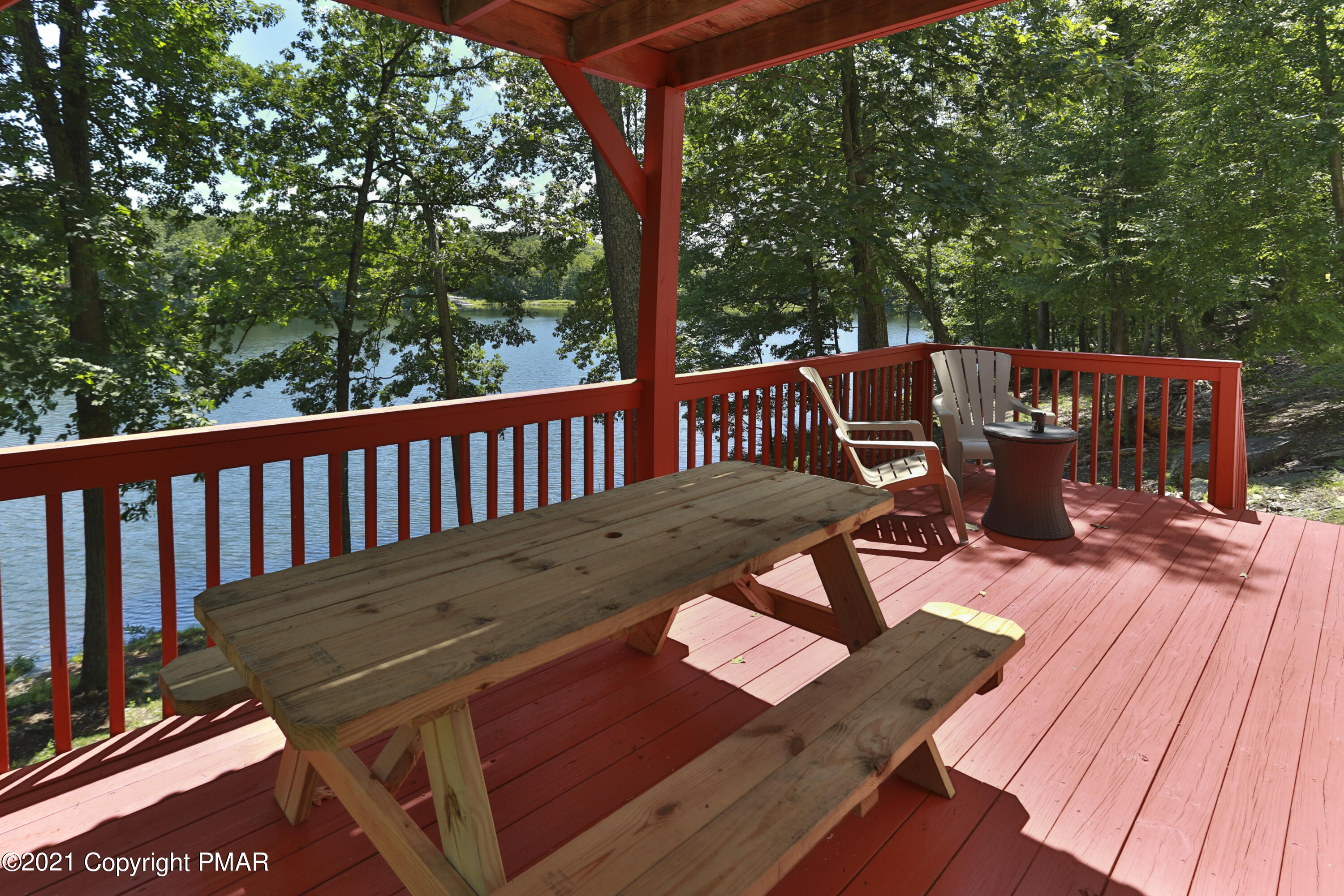 2155 Lancaster Drive Bushkill, PA 18324 - Photo 38 of 57 a view of a wooden deck with furniture