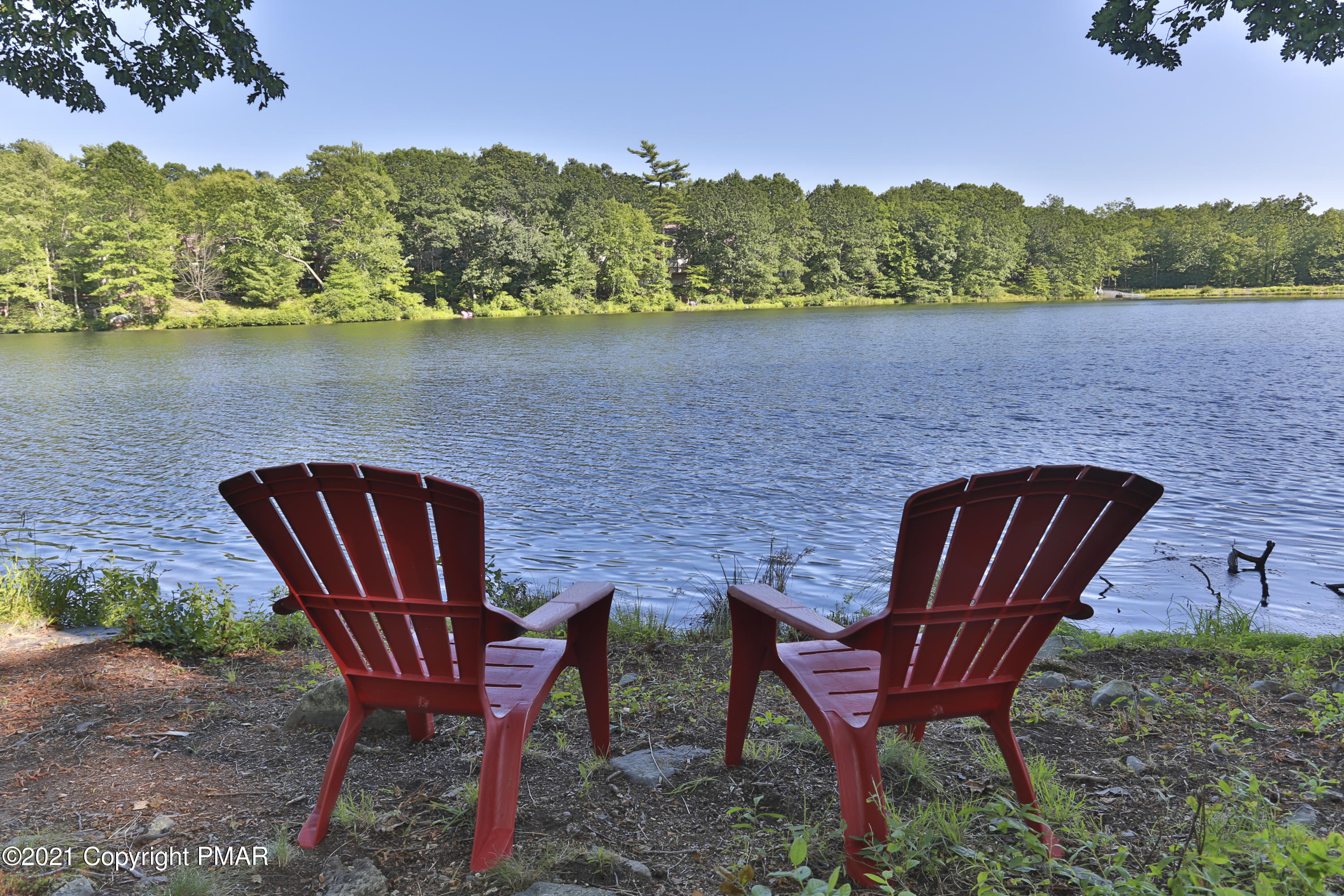 2155 Lancaster Drive Bushkill, PA 18324 - Photo 57 of 57 a view of a lake with outdoor seating