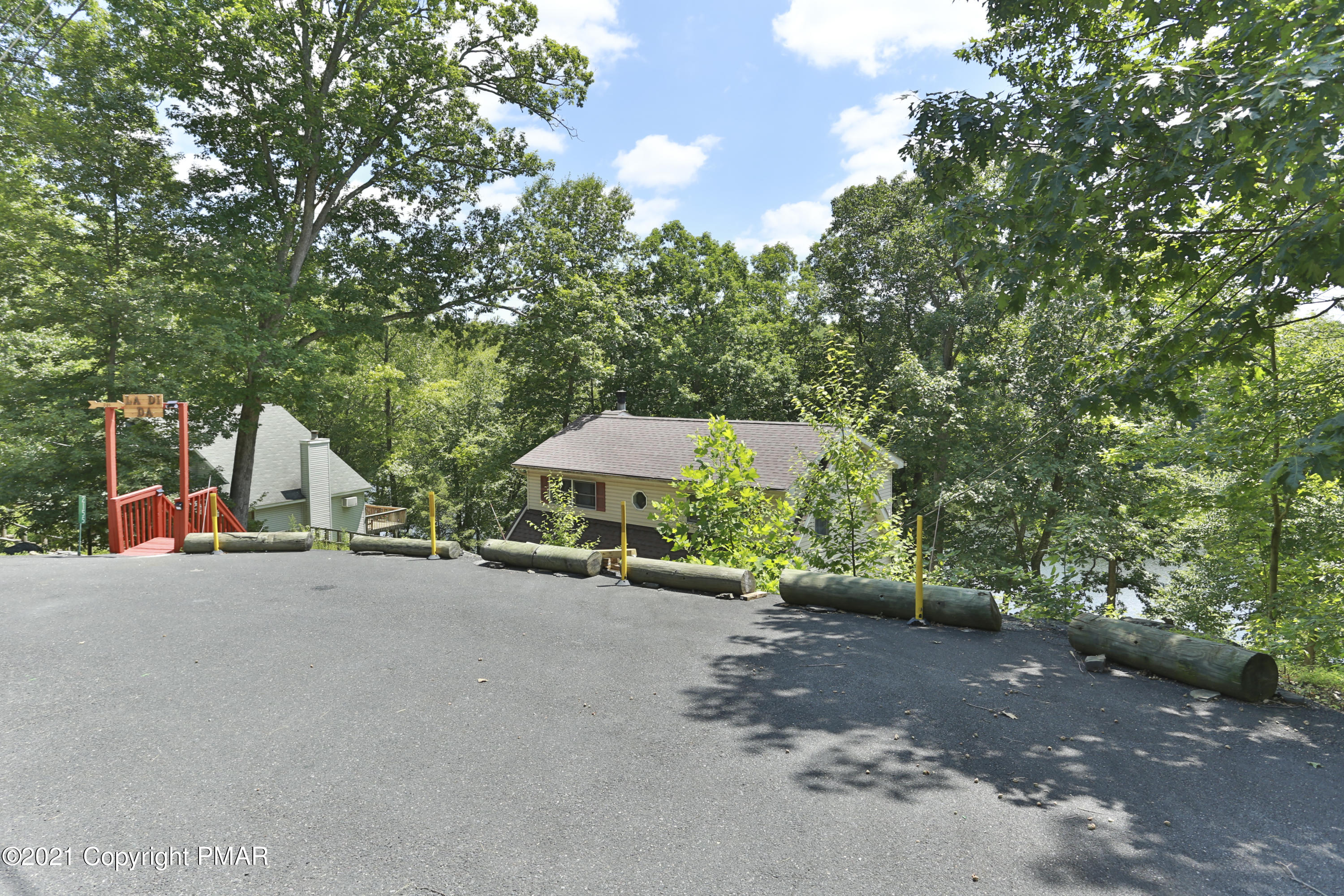 2155 Lancaster Drive Bushkill, PA 18324 - Photo 7 of 57 a view of a street with a patio