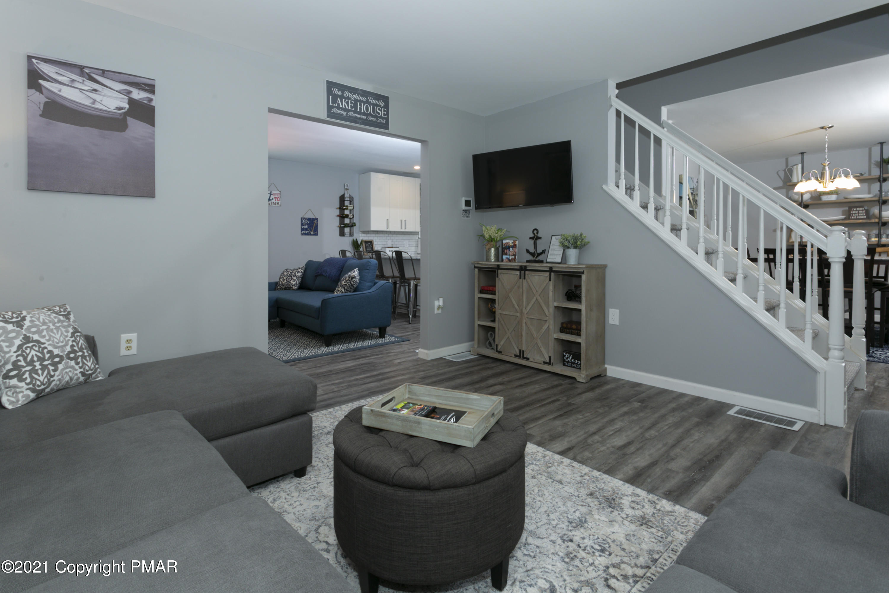 2155 Lancaster Drive Bushkill, PA 18324 - Photo 10 of 57 a living room with furniture and a flat screen tv