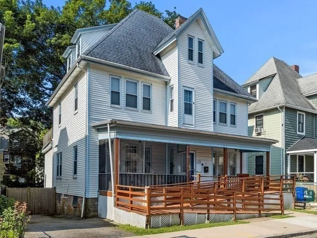 a front view of a house with garage